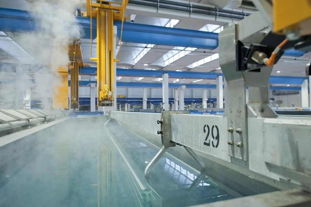 Overview of an automatic anodizing line, tanks and gantry crane.